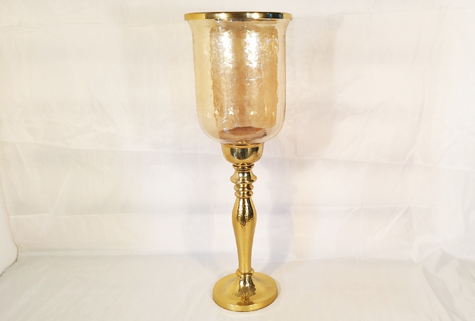 give this gold hurricane candleholder on rent