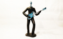 give this man with guitar showpiece  on rent
