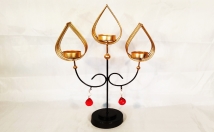 give this three tier decorative candle on rent holder